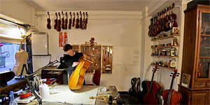 Luthier inside the old town of Valencia